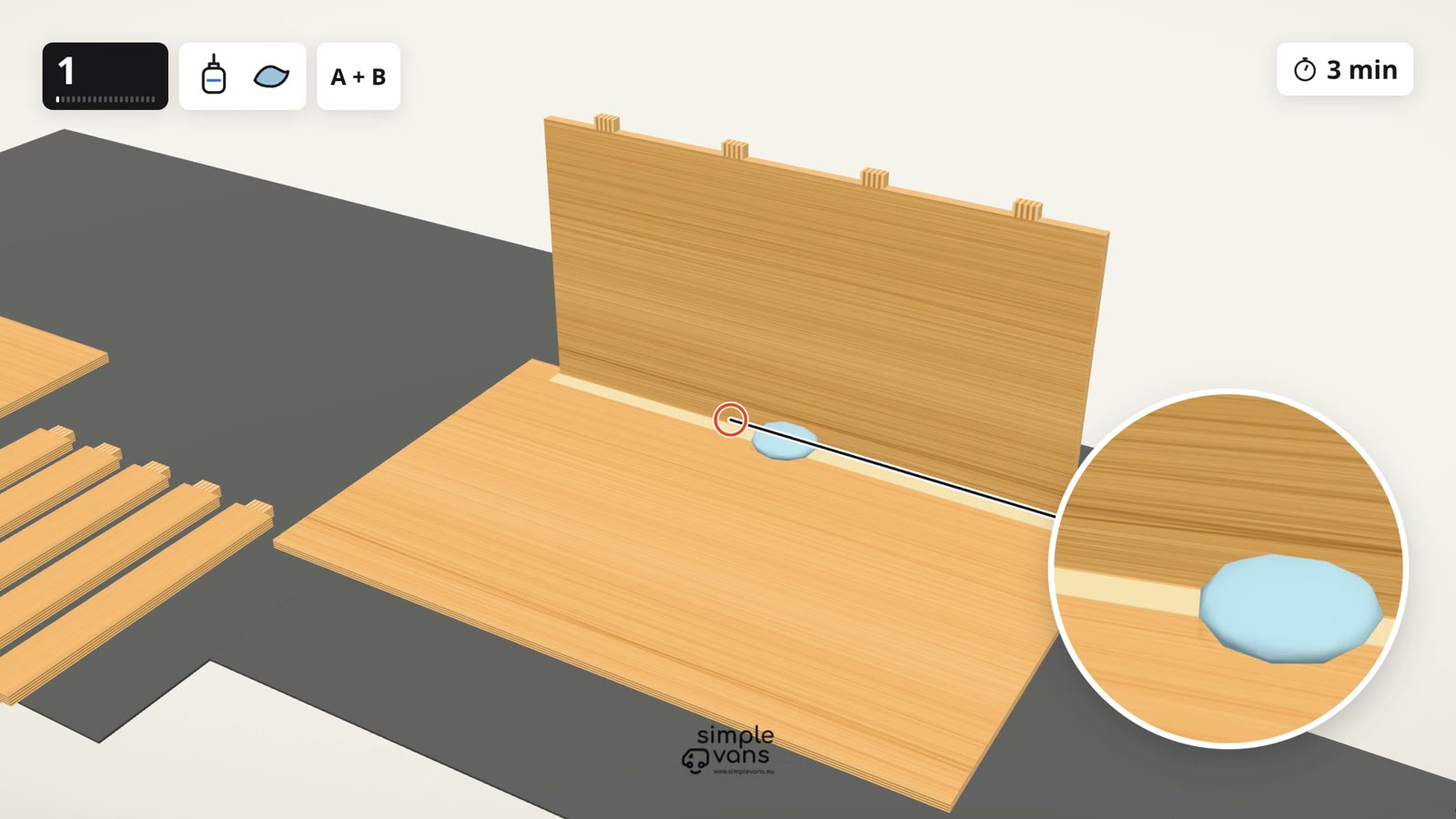La même étape dans la vidéo : la colle sort des encoches, la loupe montre le détail